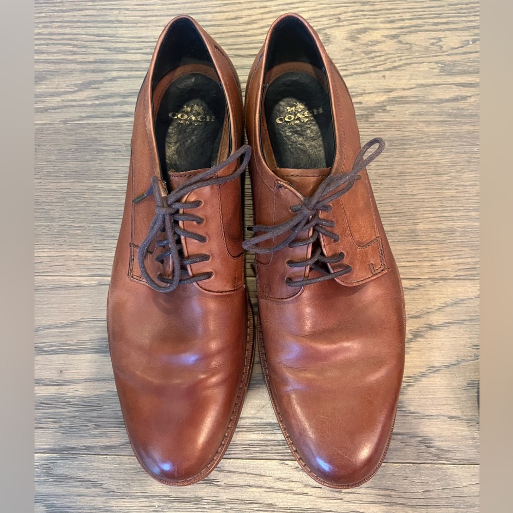 Coach Men’s Calf leather Derby shoes, men’s size 9.5D. Cognac color.